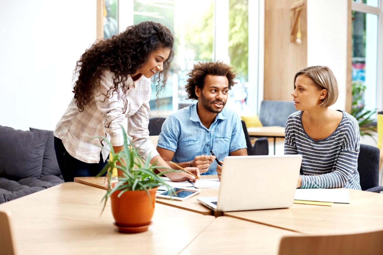 Financial analyst working with charts and reports showing progression from basic to advanced analysis